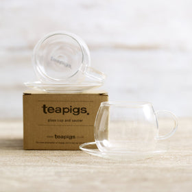 glass cup and saucer