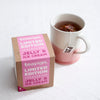 A box of 10 Jelly and Ice Cream tea temples next to a prepared cup of tea