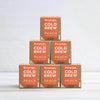 pyramid of cold brew peach and mango tea boxes